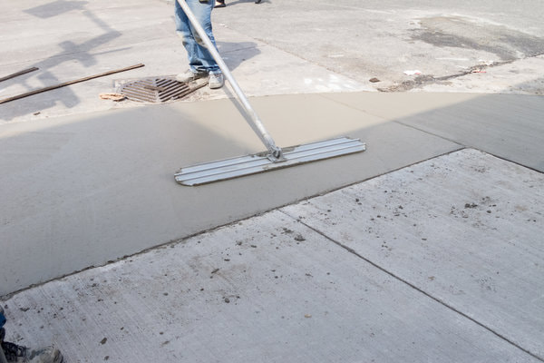 Concrete sidewalk repair in process